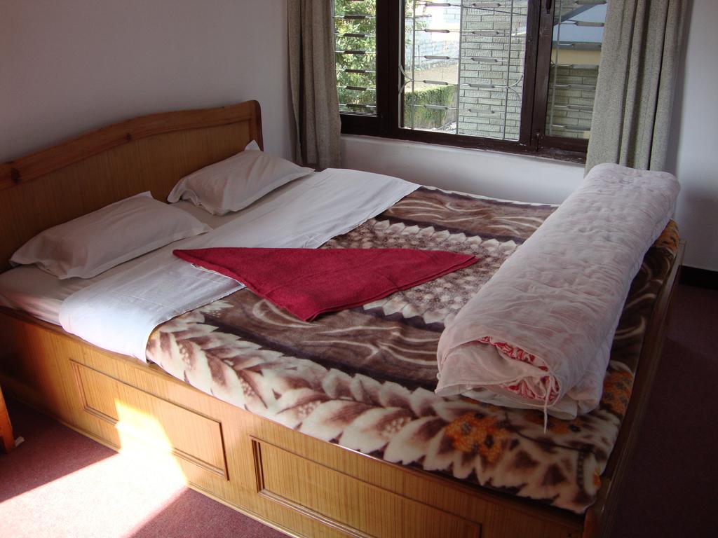 New Summit Guest House Pokhara Zimmer foto
