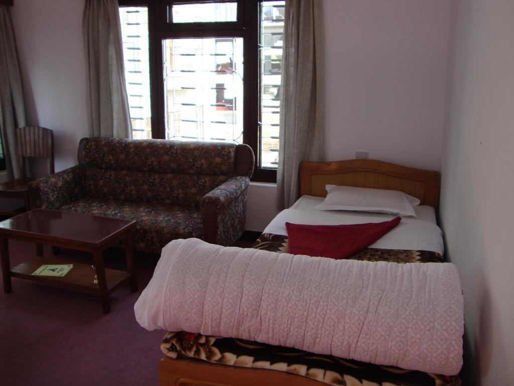 New Summit Guest House Pokhara Zimmer foto